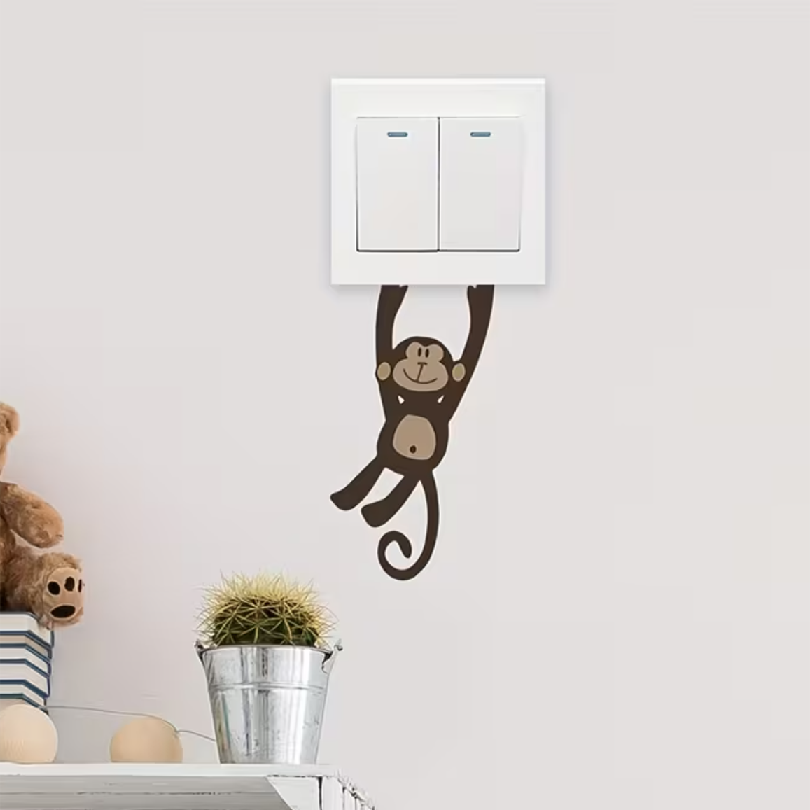 Slingeraap Lichtknop Sticker