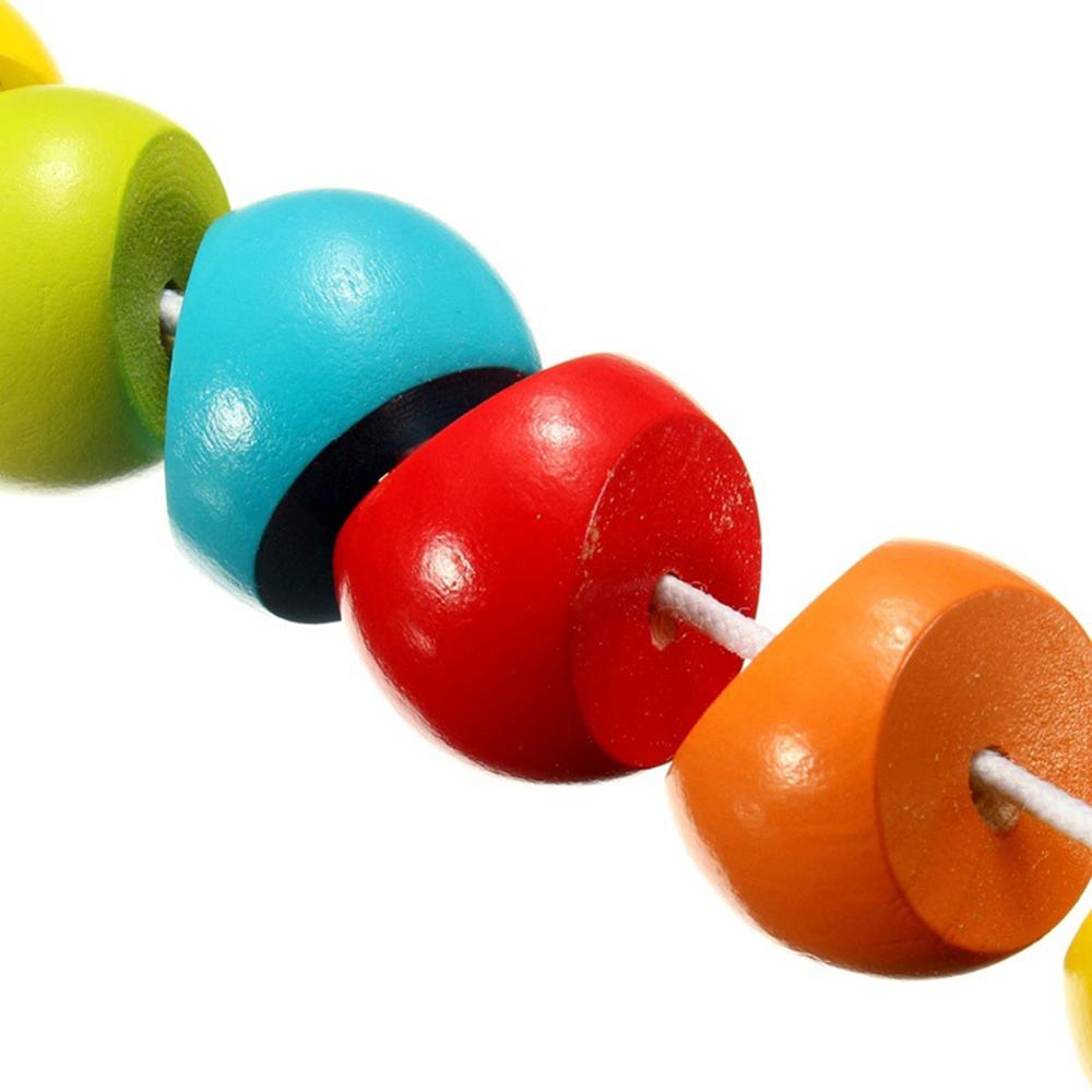 Houten frutsel rups met gekleurde kralen