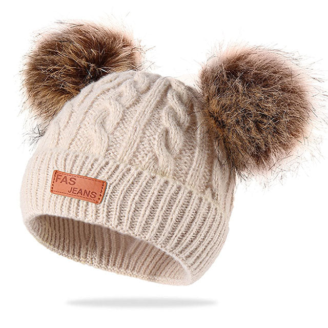 Beanie Muts met Pompons