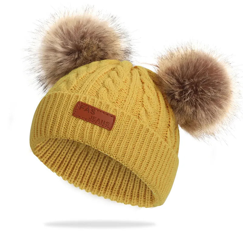 Beanie Muts met Pompons