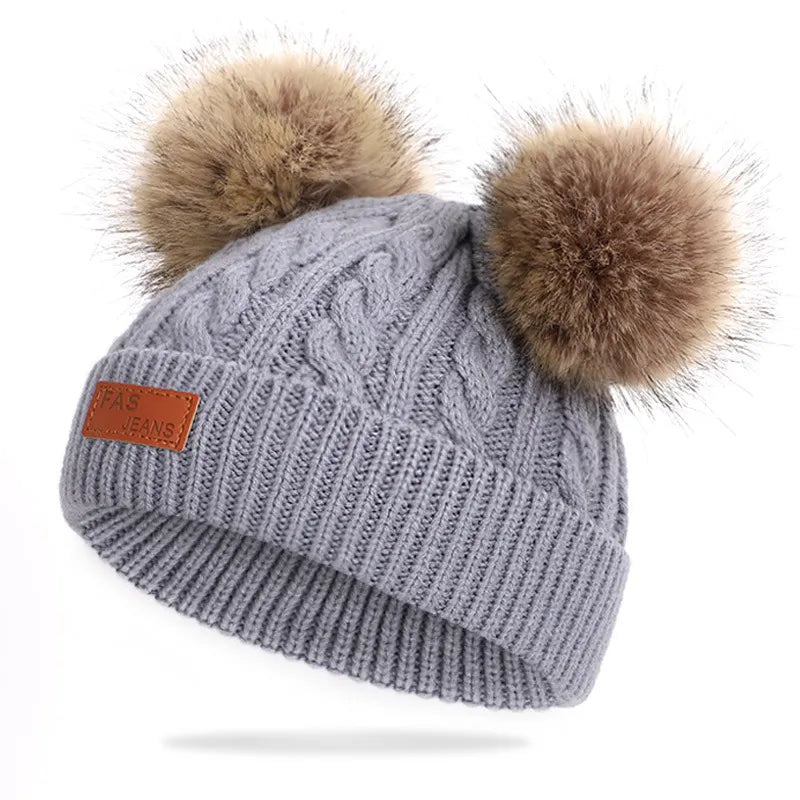 Beanie Muts met Pompons